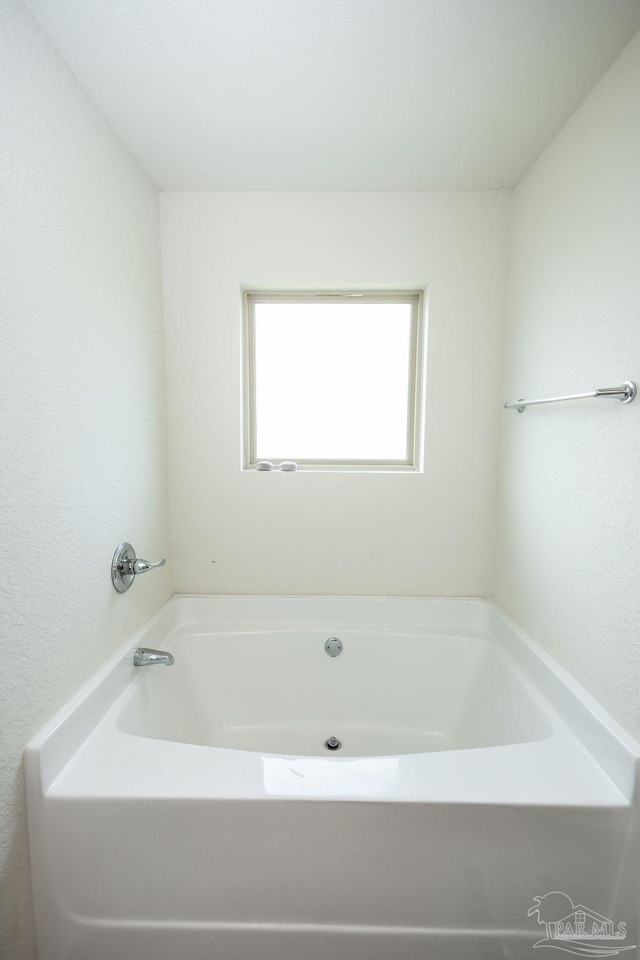 bathroom featuring a bathing tub