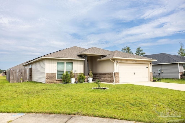 view of front of property featuring a garage and a front lawn