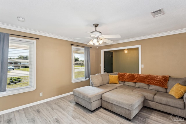 720 Lambert St, Pensacola, FL 32505 - living area with light wood-style floors, visible vents, ceiling fan, and plenty of natural light