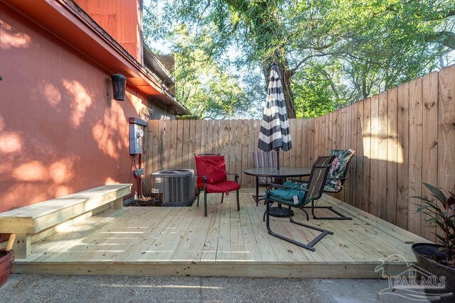 wooden terrace featuring central AC