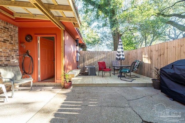 view of patio / terrace with grilling area and central AC unit