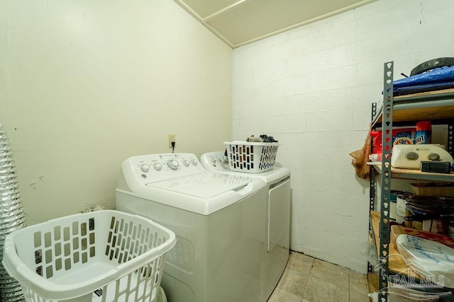 laundry area featuring separate washer and dryer