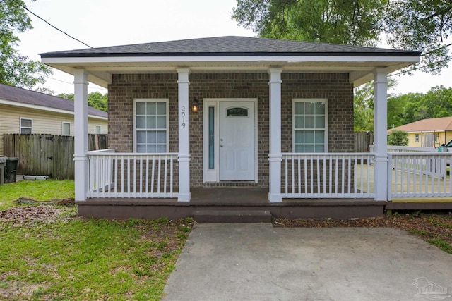 view of front of property featuring covered porch