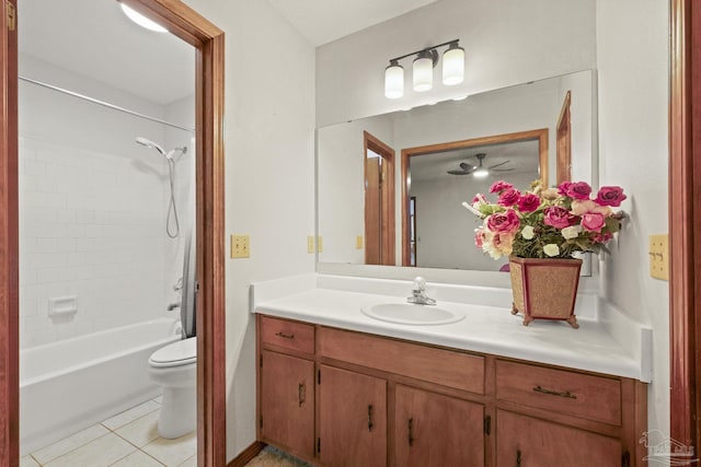 full bathroom with tile patterned floors, vanity, bathing tub / shower combination, ceiling fan, and toilet