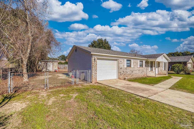 ranch-style home with a front yard and a garage