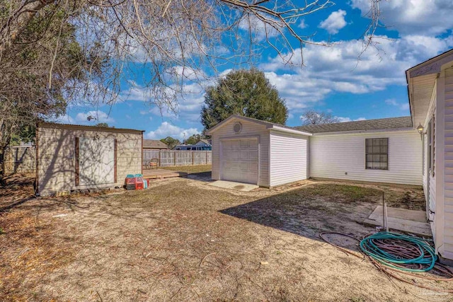 view of yard featuring a storage unit