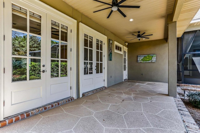 view of patio / terrace with french doors and ceiling fan