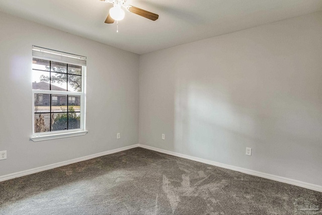 carpeted empty room with ceiling fan