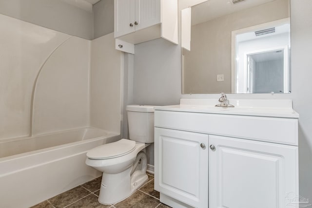 full bathroom featuring vanity, tile patterned flooring, shower / bathtub combination, and toilet