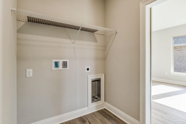 clothes washing area with electric dryer hookup, wood-type flooring, and hookup for a washing machine