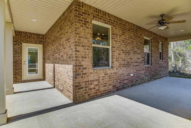 view of patio featuring ceiling fan