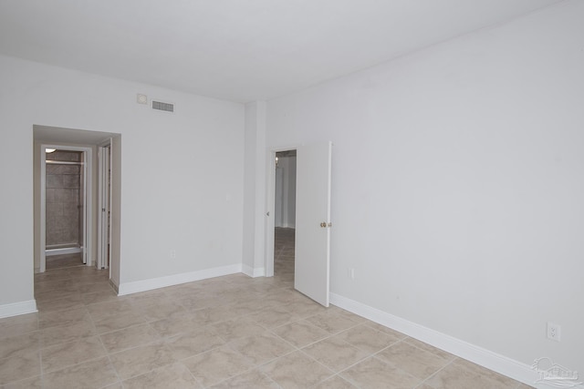 view of tiled spare room