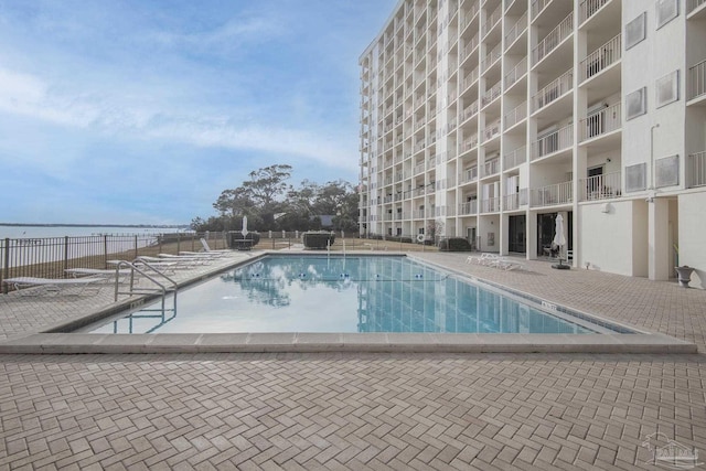 view of swimming pool featuring a patio