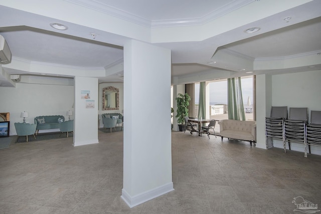 basement with ornamental molding, a wall mounted air conditioner, and light tile patterned floors