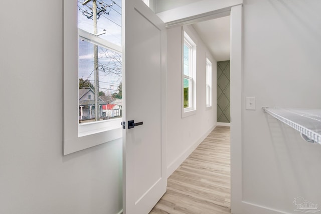 doorway to outside featuring light hardwood / wood-style flooring