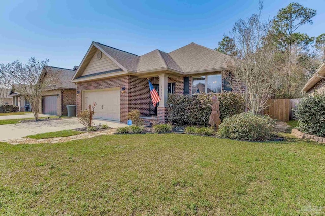 ranch-style home with brick siding, a front lawn, an attached garage, and fence