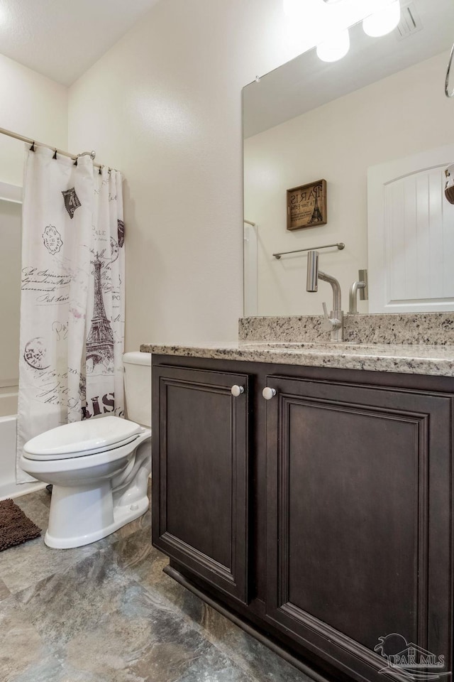 bathroom featuring shower / bath combination with curtain, vanity, and toilet