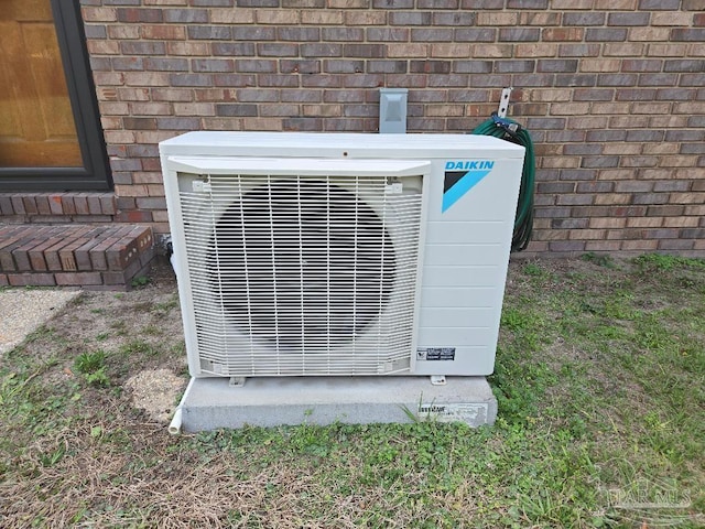 1012 Colbert Ave, Pensacola, FL 32507 - details with brick siding and ac unit