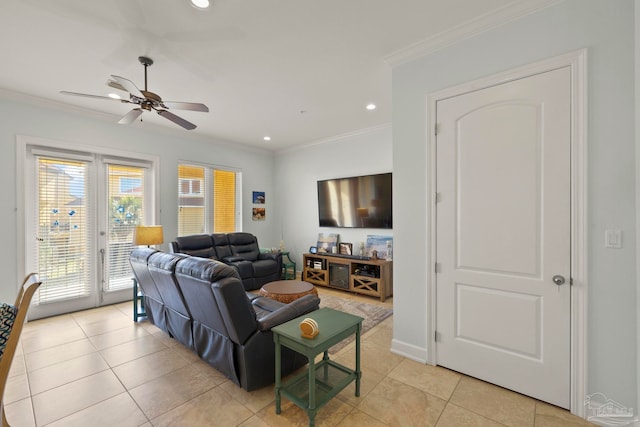 tiled living room featuring ceiling fan and ornamental molding