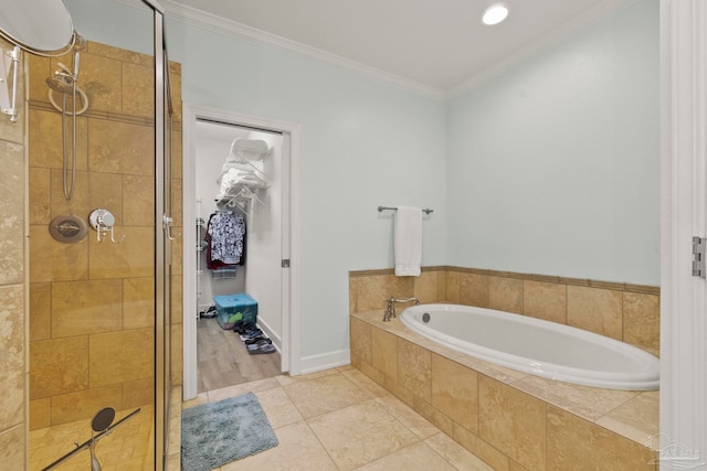 bathroom featuring shower with separate bathtub, crown molding, and hardwood / wood-style floors