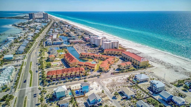 drone / aerial view with a view of the beach and a water view