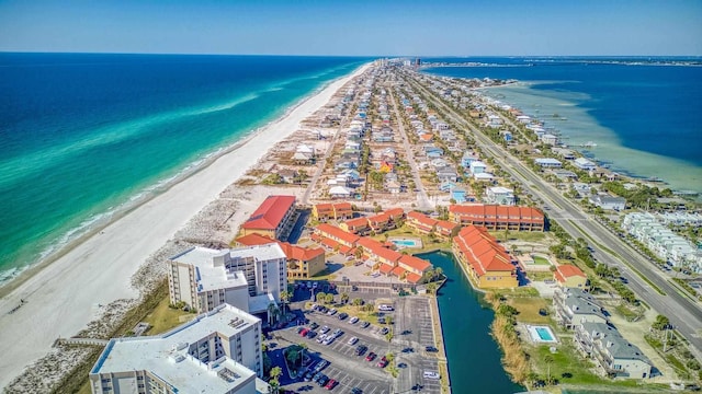 aerial view with a view of the beach and a water view