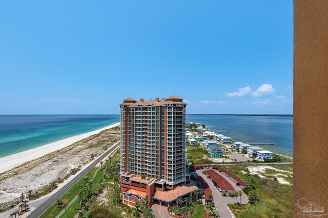 aerial view with a beach view and a water view