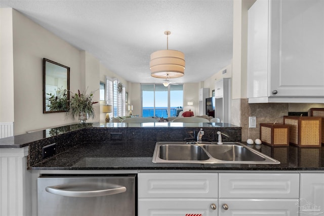 kitchen with white cabinetry, stainless steel dishwasher, sink, and pendant lighting