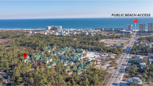 bird's eye view featuring a water view and a city view