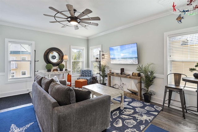 living room with ceiling fan, ornamental molding, and wood finished floors