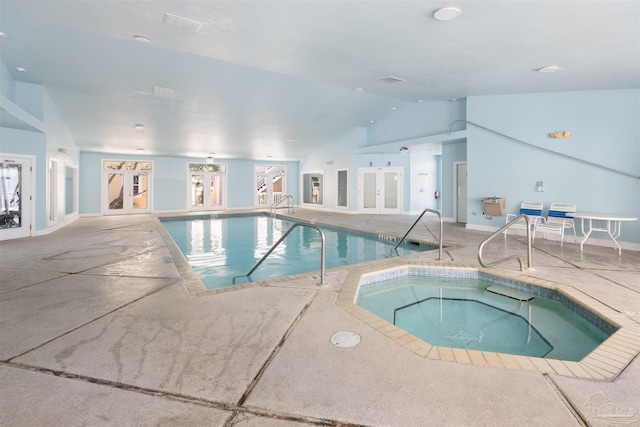 community pool with an indoor hot tub