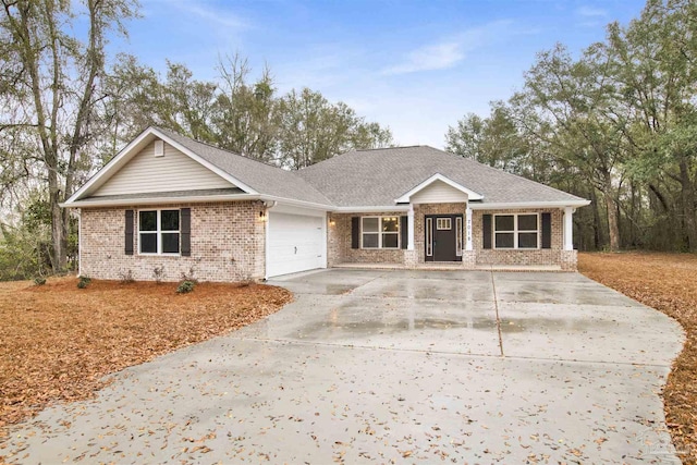 view of front of property with a garage