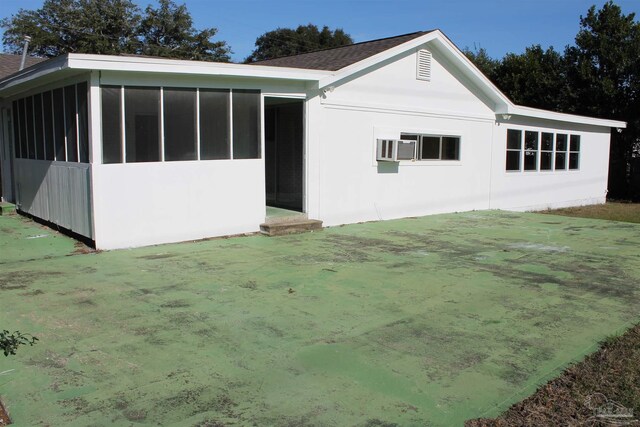 exterior space featuring a sunroom