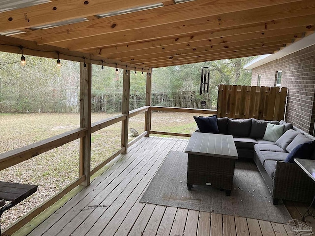 deck with fence and an outdoor living space