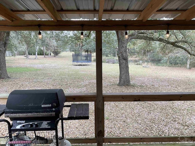 view of yard with a trampoline