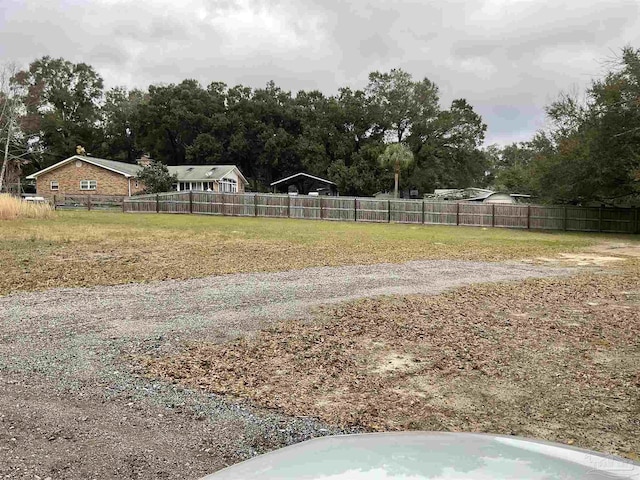 view of yard with fence