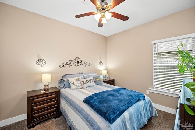 bedroom featuring ceiling fan, carpet floors, and baseboards