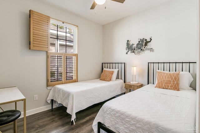 bedroom featuring ceiling fan and dark hardwood / wood-style floors