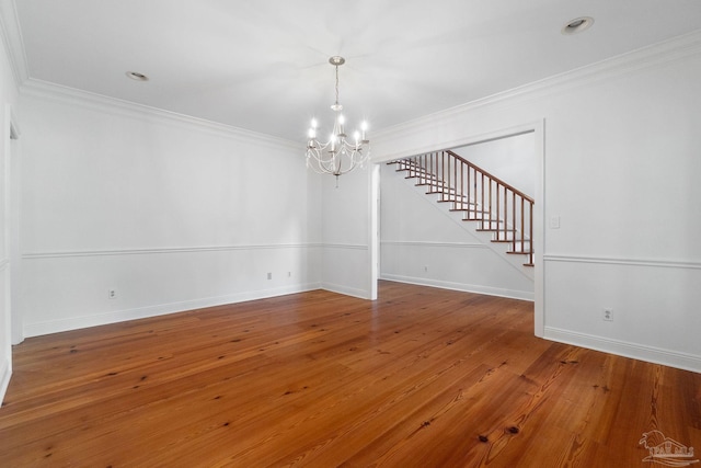 unfurnished dining area with stairs, baseboards, a chandelier, and crown molding