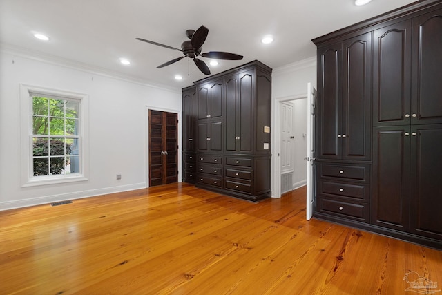 unfurnished bedroom featuring visible vents, baseboards, light wood-style floors, ornamental molding, and recessed lighting