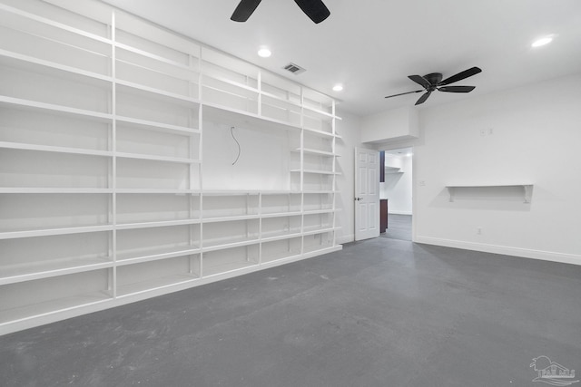 unfurnished living room with finished concrete flooring, a ceiling fan, baseboards, recessed lighting, and visible vents