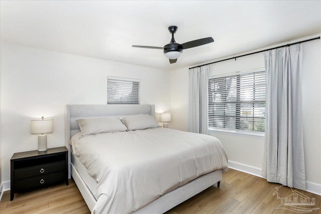 2707 E De Soto St, Pensacola, FL 32503 - bedroom featuring baseboards, a ceiling fan, and wood finished floors