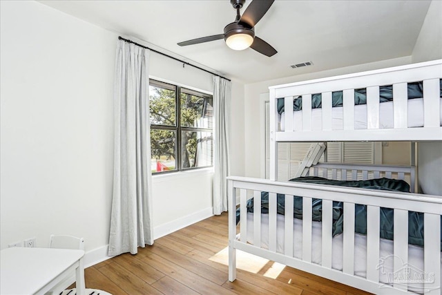 2707 E De Soto St, Pensacola, FL 32503 - bedroom with ceiling fan, visible vents, baseboards, and wood-type flooring