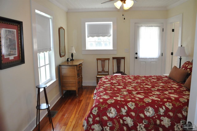 4565 Forsyth St, Bagdad, FL 32583 - bedroom with ornamental molding, hardwood / wood-style floors, and baseboards