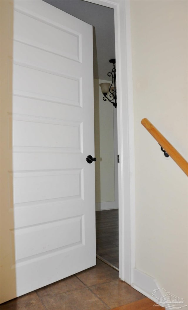 4565 Forsyth St, Bagdad, FL 32583 - interior space with baseboards and dark tile patterned flooring