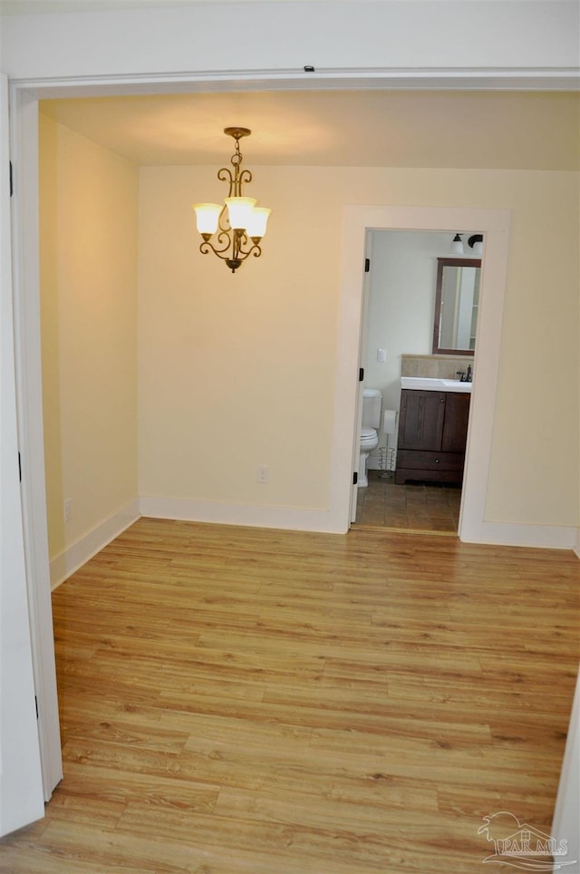 4565 Forsyth St, Bagdad, FL 32583 - empty room featuring light wood finished floors and baseboards