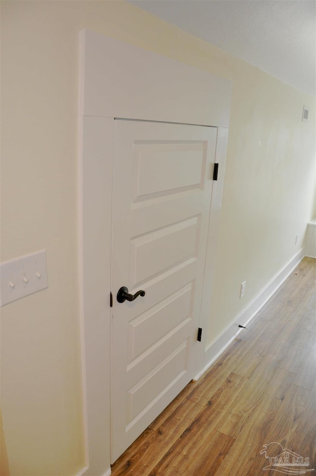 4565 Forsyth St, Bagdad, FL 32583 - detailed view of wood finished floors and baseboards