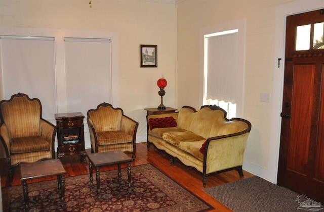 4565 Forsyth St, Bagdad, FL 32583 - living area featuring wood finished floors and baseboards