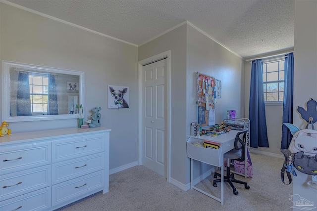 bedroom with a textured ceiling, crown molding, baseboards, and light carpet