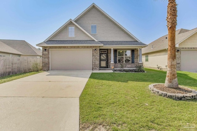 craftsman house with a front yard and a garage